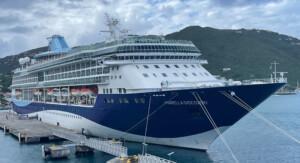 Marella Discovery cruise ship docked at port with mountainous landscape in background, highlighting ALMACO’s turnkey marine outfitting and modular accommodation solutions for cruise refurbishment and newbuilds.
