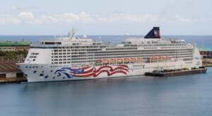 Pride of America cruise ship docked at port, showcasing ALMACO’s marine outfitting and turnkey accommodation solutions for large passenger vessels.